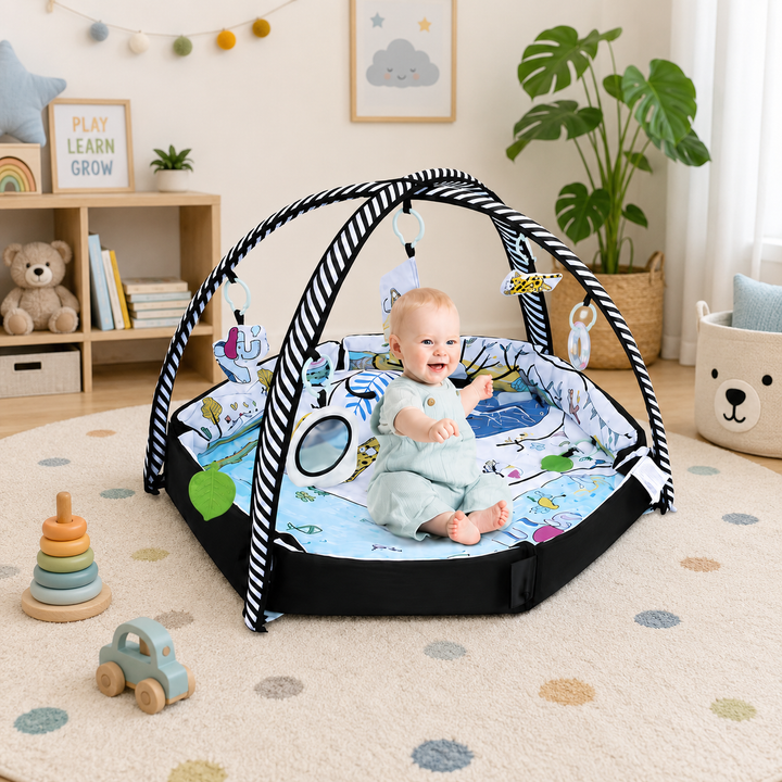 Baby Play Gym Mat – Soft Padded Activity Mat with Hanging Toys, Teether, Pillow & Musical Elements | Sensory Development Play Area for Infants 0 Months+ | Foldable Baby Gym with Cloth Book & Mirror